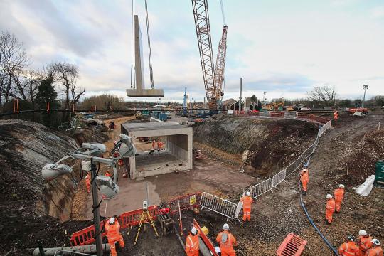 First wing wall section being lowered. (Courtesy Network Rail)